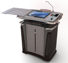 The ILS14PA is the first in a series of cost-effective well-designed multimedia classroom lecterns. You only need to add your own PC, everything else that is needed in a lectern is included: 19inch 4:3, or 20 inch wide screen pen monitor, 120 watt amplifier, gooseneck and wireless microphones, notebook interface panel. There also is an integrated controller for external devices, and devices that are added inside the 19 inch rack bay. Optional matching teacher desk.